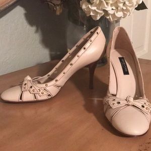 NWOB Sergio Rossi bow grommet leather pumps.